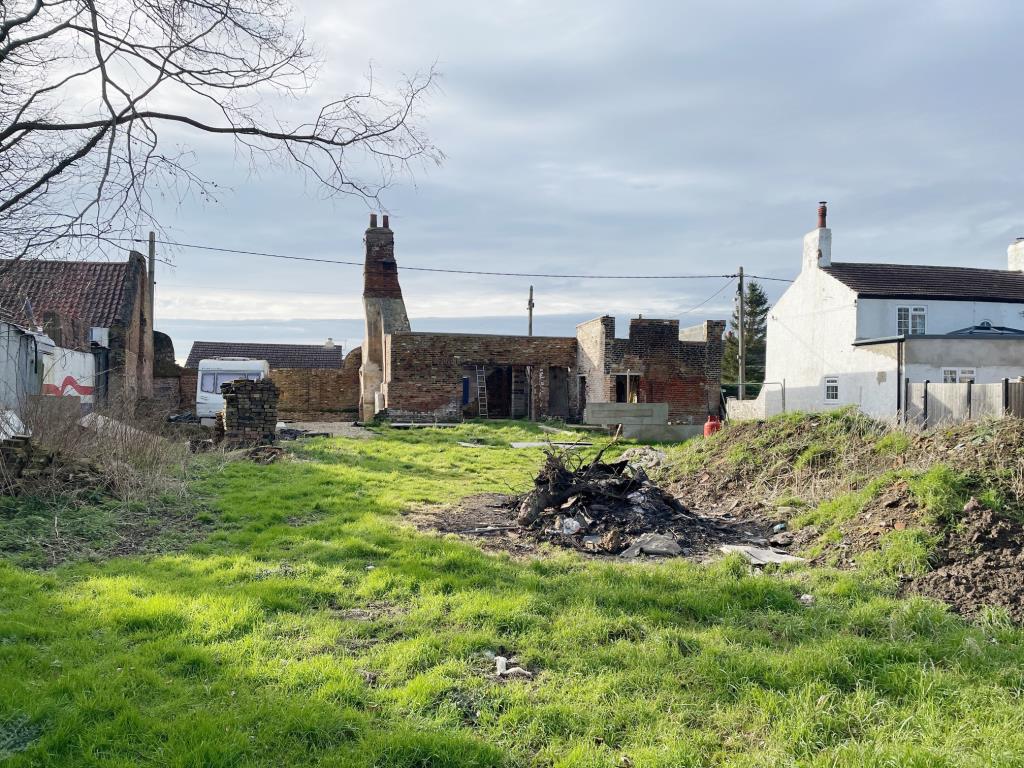 Lot: 101 - COTTAGE RENOVATION PROJECT WITH PLANNING IN VILLAGE LOCATION - View of the rear of the property from the bottom of the garden